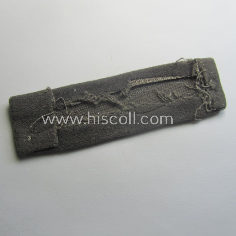 Single, WH (Luftwaffe) greyish-blue-coloured, NCO-type rank-patch (aka 'moustache'), as was intended for usage by a non-commissioned officer with the rank of: 'Unteroffizier'