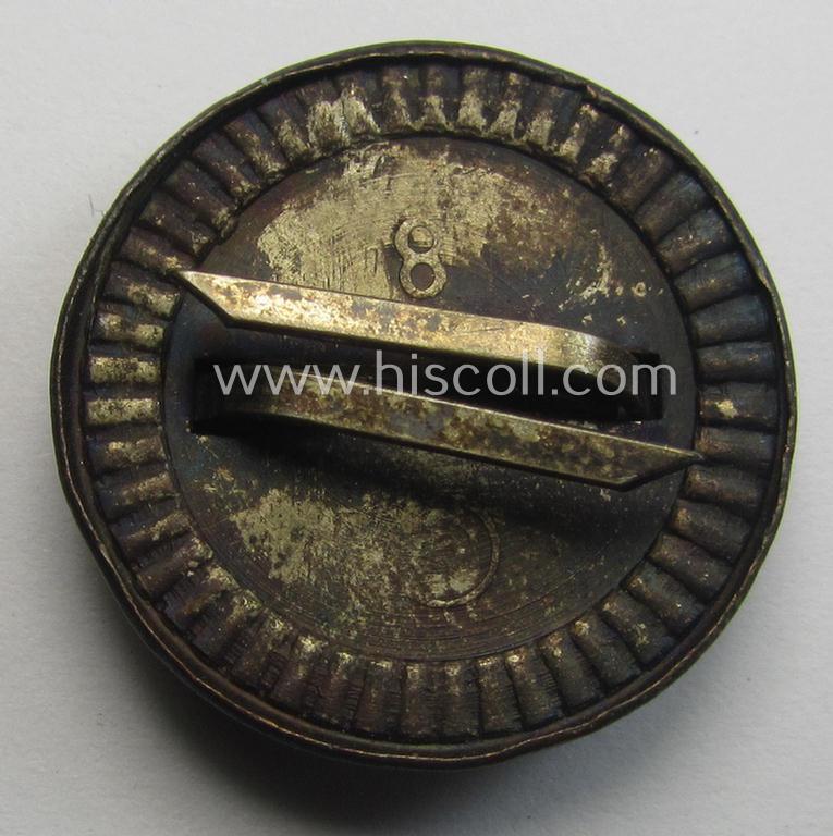 Political-style- (ie. N.S.D.A.P.-related-) multi-pieced visor- (ie. 'Schirmmützen'-) cap-cocarde which is neatly: 'RzM' and/or '8' marked on its back