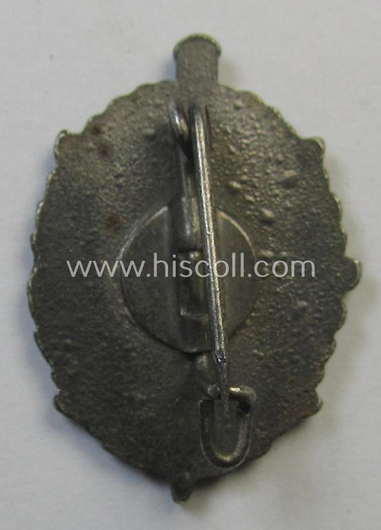 Superb - and with certainty rarely encountered! - very unusual, zinc- (ie. 'Feinzink'-) based, WH (Kriegsmarine) related so-called: 'Ehrennadel für Verdienste auf dem Gebiet der Wehrbetreuung 1943'