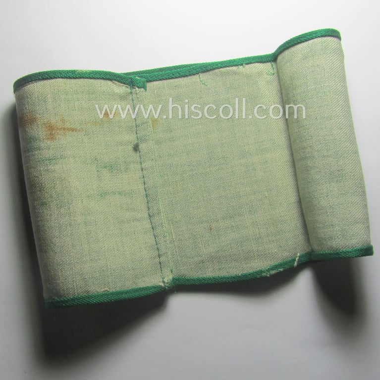 Minimally used - and most certainly rarely seen! - 'N.S.D.A.P.'- (ie. 'Luftschutz'-) related armband (ie. 'Armbinde') being of the 'entirely printed'-type showing a swastika and text: 'Luftschutz NSDAP'