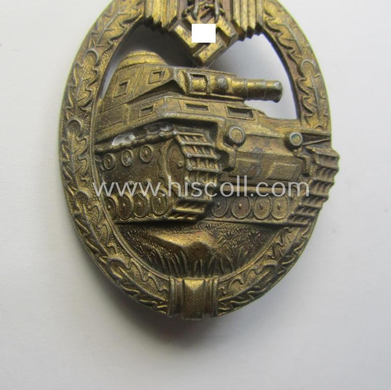 'Panzerkampfabz. in Bronze' (or: bronze-class panzer assault-badge or PAB) being a zinc- (ie. 'Feinzink'-) version (having a so-called: 'horizontal'-catch-set-up) as was procuced by the: 'Steinhauer u. Lück' (ie. 'S.& L.') company