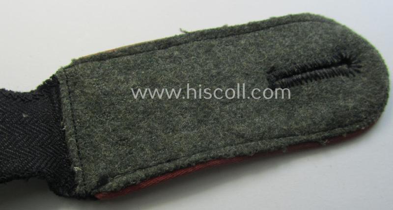 Attractive - albeit regrettably single! - Waffen-SS, EM-type shoulderstrap as piped in the bright-pink-coloured branchcolour as was intended for usage by an: 'SS-Mann' who served within the: 'SS-Panzer-Truppen'