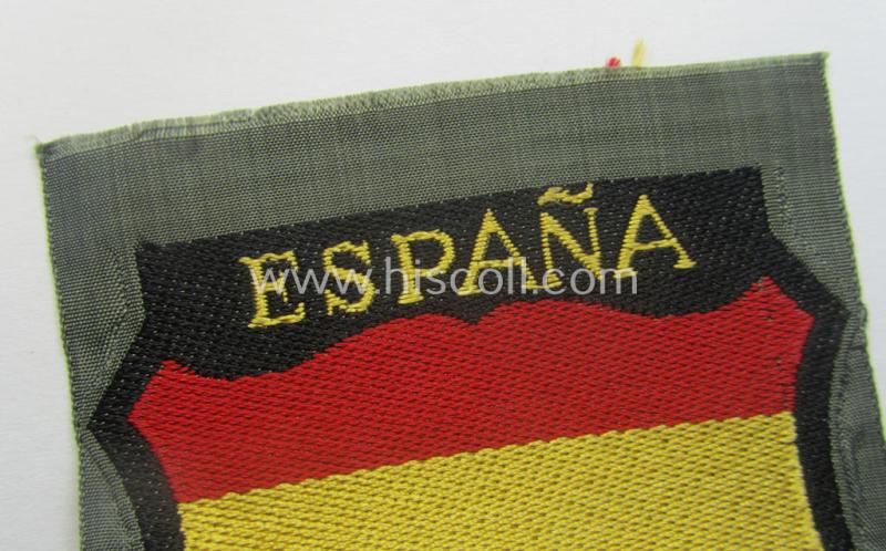 'BeVo'-type armshield entitled: 'España' (being a 'virtually mint- ie. unissued' example as was intended for a volunteer who served within the 'Deutsche Wehrmacht' ie. within the famous 'Blue Division' ie. 'Blauer Division')