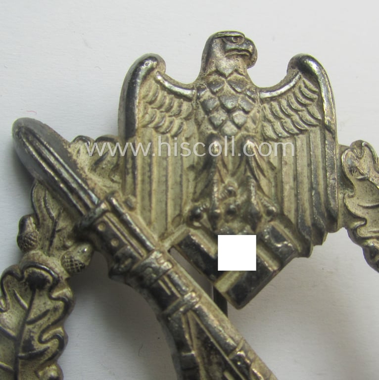'Infanterie-Sturmabzeichen in Silber' being a non-maker-marked, 'solid-back'- and/or typical zinc- (ie. 'Feinzink'-) based specimen of the so-called: 'egg-head'-pattern (as was presumably produced by the: 'Gustav Brehmer'-company)