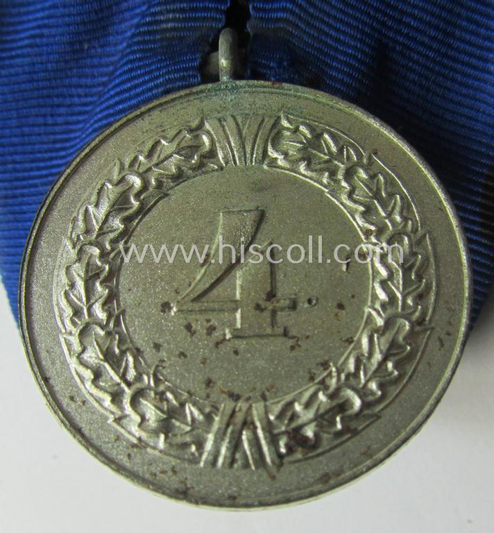 Neat - and truly used! - silver-toned WH (Heeres o. KM) so-called: 'Einzelspange' showing a: 'WH-Dienstauszeichnung 4. Stufe' (as was intended for 4 years of loyal-service) and that shows a detailed (albeit stained), eagle-device, period-attached