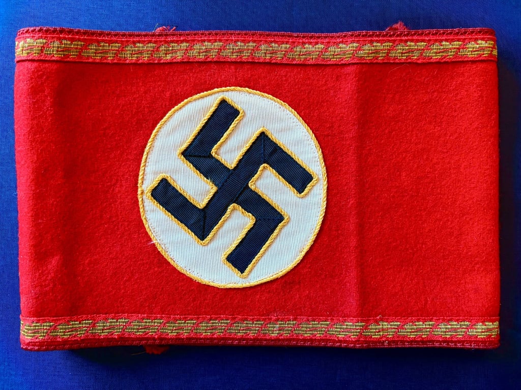 GERMAN WWII AUTHENTIC POLITICAL LEADERS NSDAP THIRD REICH GAU LEVEL ARMBAND WITH RZM PAPER TAG.