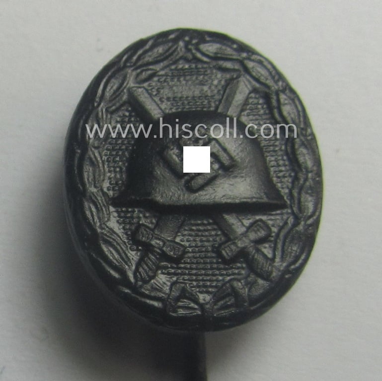Neat - and 17 mm. sized! - miniature lapel-pin (ie. 'Halbminiatur') depicting a: 'Verwundeten-Abzeichen in Schwarz' (or: black-class wound-badge) being a non-maker-marked example