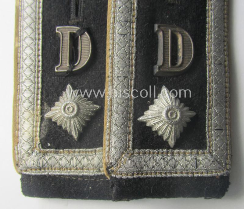 Superb pair of Waffen-SS NCO-type, 'cyphered' shoulderstraps as piped in the white-coloured branchcolour as was intended for usage by an: 'SS-Oberscharführer' who served within the: SS-Rgt. 'Deutschland' (2. SS-Pz-Div. "Das Reich")