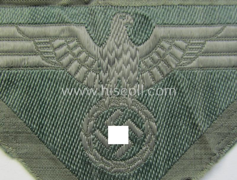 Later-war-period WH (Heeres) so-called: 'M44'-pattern- and/or: trapezoid-shaped breasteagle ie. 'Brustadler für Mannschaften u. Uffz.' (being a field-grey-coloured example that shows an interwoven 'BeVo-Wuppertal'-makers'-designation)