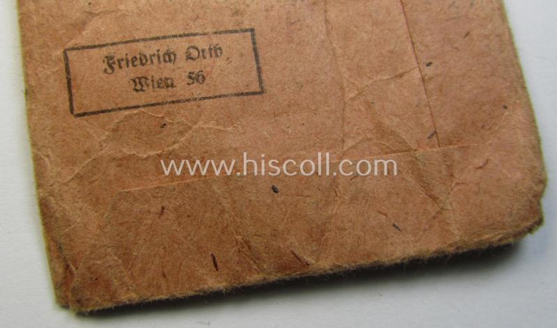 Attractive medal-set: 'Winterschlacht im Osten 1941-42' being a maker- (ie. '15'-) marked specimen by the maker- (ie. 'Hersteller') named: 'Friedrich Orth' and that comes packed in its original, 'Zellstoff'-based pouch