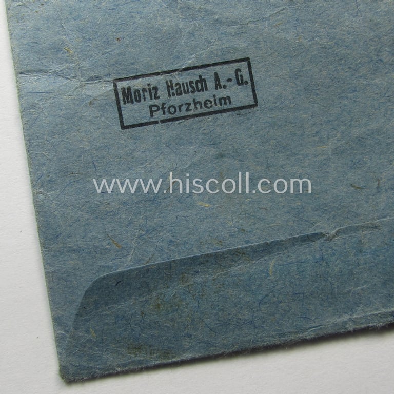 'Ehrenkreuz der deutschen Mutter - zweite Stufe' (or: silver-class mothers'-cross) that came mounted onto its long-sized ribbon and that came stored in its period pouch by the maker: 'Moriz Hausch A.-G. - Pforzheim'