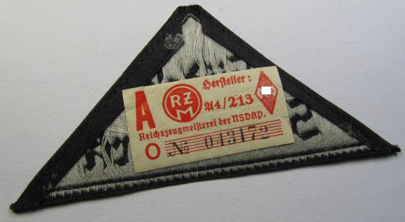 Attractive, 'HJ' ('Hitlerjugend') ie. 'BDM' ('Bund Deutscher Mädel'-) district-triangle (ie. 'Gebietsdreieck') entitled: 'Südost Steiermark' (being a 'virtually mint- ie. unissued' example that still retains its paper-based 'RzM'-etik...