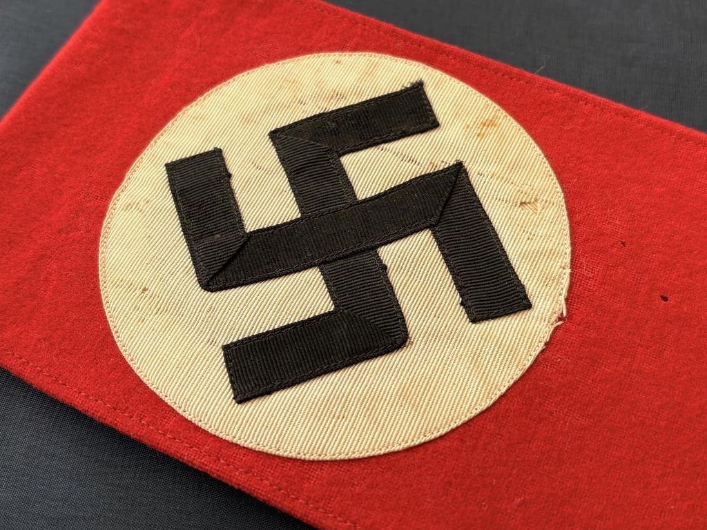 WWII GERMAN POLITICAL LEADERS’ THIRD REICH NAZI ARMBAND WITH RZM PAPER TAG.