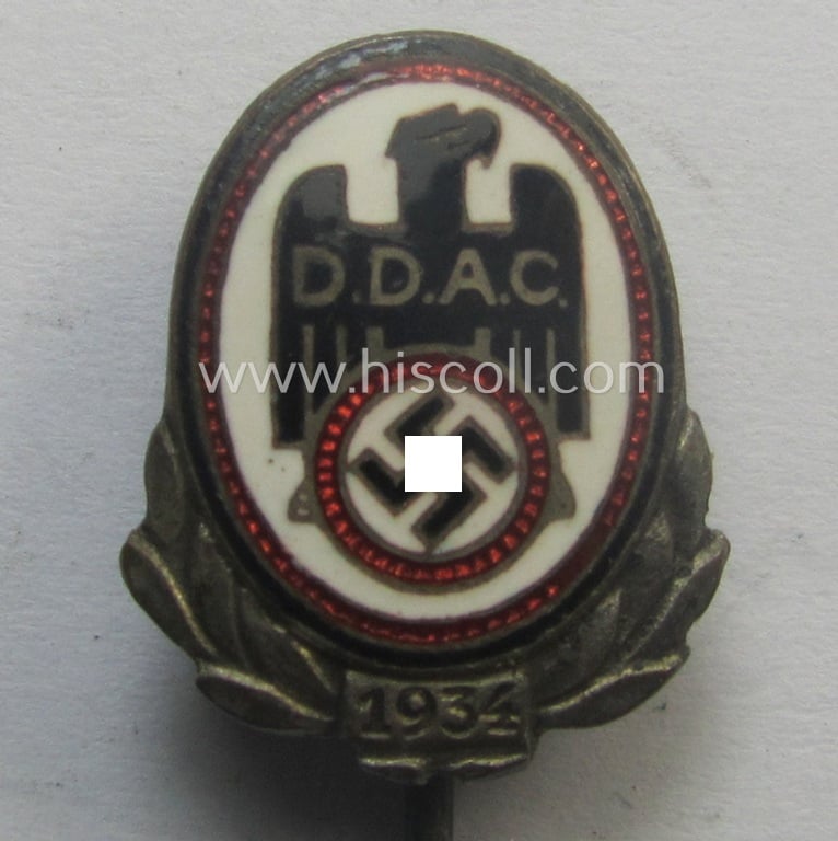 Neatly enamelled- (and multi-coloured!) 'Silberne Ehrennadel der Deutsche Automobil Club (D.D.A.C.) - 1934' being a detailed example  that shows a makers- (ie. 'AD. Schwerdt'-) and/or: 'Ges. Gesch.'-patent-pending-designation