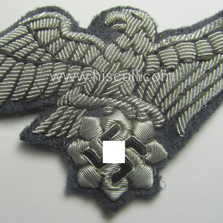 Stunning - and very scarcely encountered! - officers'-pattern, 'Luftschutz' (ie. RLB-) breasteagle being a neatly hand-embroidered- and luxuriously-styled example that is executed onto a bluish-grey-coloured- and/or woolen-based background