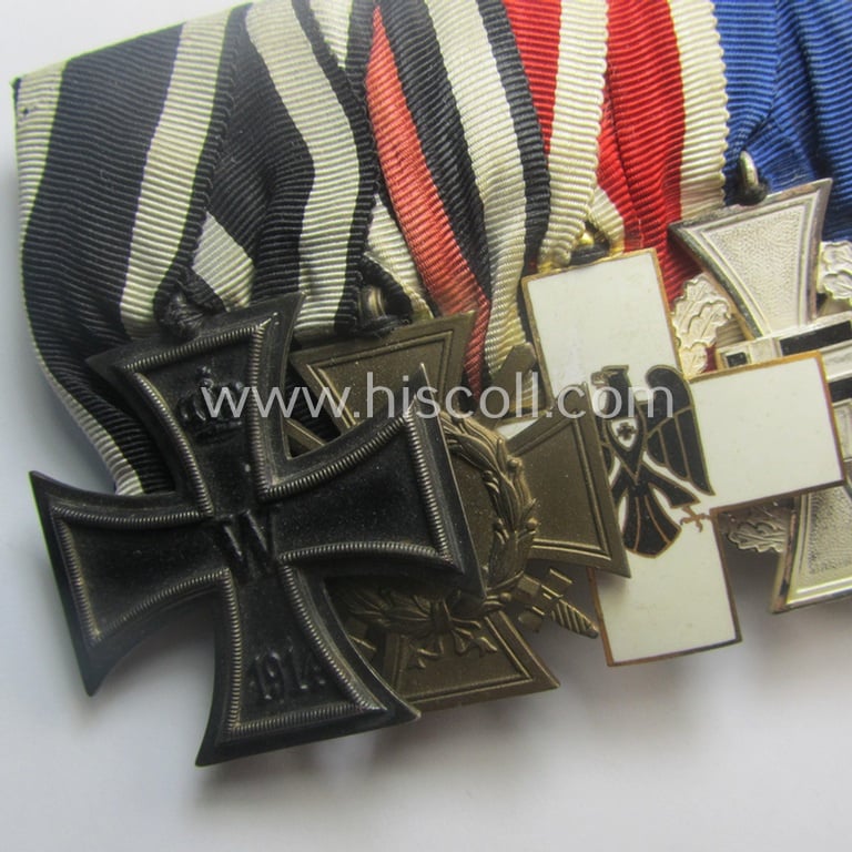 Superb, 8-pieced WWI- (ie. TR-) related medal-bar (ie. 'Ordenspange') depicting an: 'EKII.Kl., an: 'FKK 1914-18 mit S.', an: 'EZ für D. Vp 3. Stf.', a: 'TD-Ez. der 2. Kl.', a: 'Deu. Olympia-E.medaille 1936' and three Austrian WWI-period comm. medals