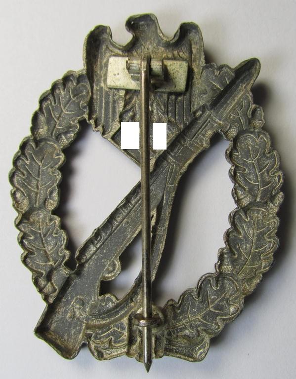 Attractive, 'hollow-back' 'Infanterie Sturmabzeichen in Silber' (or: silver infantry-assault badge ie. IAB) being a non-maker-marked example as executed in zinc-based metal (ie. 'Feinzink') as was produced by the: 'Wilh. Deumer'-company