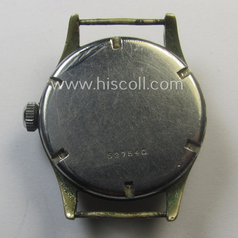 WH (Kriegsmarine) WWII-period wrist-watch (or: 'Dienstuhr') of the make: 'K.M. Zentra' having a silverish-white-coloured dial-plate and neatly engraved number on its back that reads: '527540'