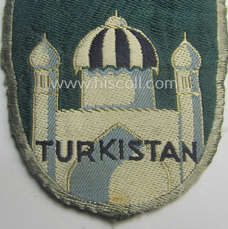Superb - truly used- and/or worn! - 'BeVo'-type armshield (of the first pattern!) entitled: 'Biz Alla Bilen - Turkistan' (as intended for a volunteer who served within the: 'Deutsche Wehrmacht' ie. within the: 'Turkistanisches Legion')
