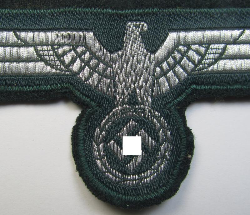 WH (Heeres) breast-eagle as executed in 'BeVo'-type-, so-called: 'flat-wire'-weave-pattern and pre-mounted on darker-green-coloured wool as was specifically intended for usage by soldiers (ie. NCOs) on their dress-tunics (ie. 'Waffenröcke')