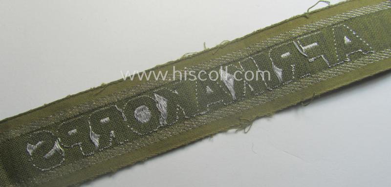 Truly worn, 'BeVo'-like cuff-title (ie. 'Ärmelstreifen') entitled: 'Afrikakorps' being a with certainty issued example that comes in an overall nice- (ie. hardly shortened- and/or once tunic-attached-), condition