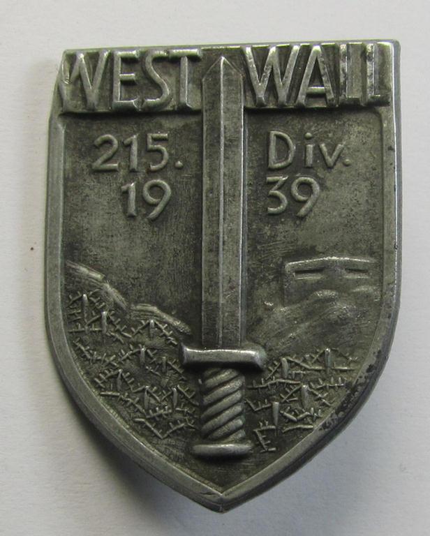 Attractive - and actually quite scarcely encountered! - WH (Heeres) so-called: 'Truppen-Traditionsabzeichen des 215. Infanterie Division' as executed in greyish-coloured zinc-based metal (ie. 'Feinzink')