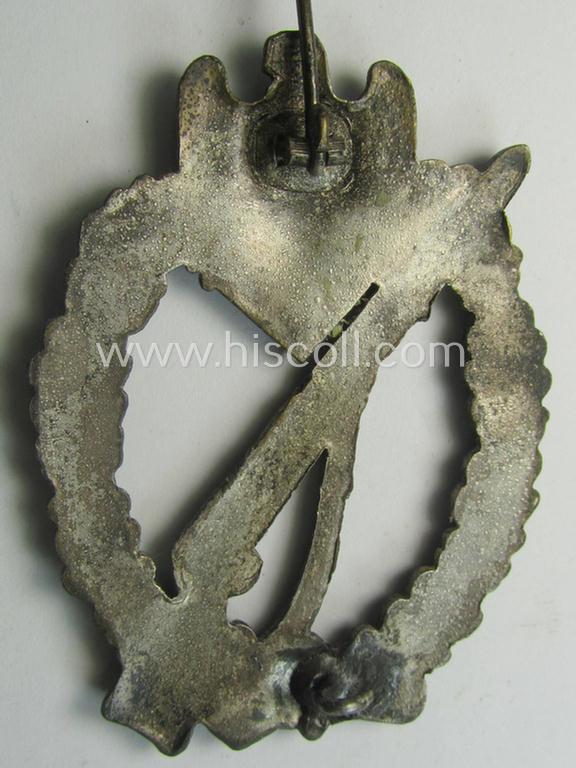 Attractive, 'solid-back' 'Infanterie Sturmabzeichen in Silber' (or: silver infantry-assault badge ie. IAB) being a non-maker-marked example as executed in zinc-based metal (ie. 'Feinzink') as was produced by the: 'Wilh. Deumer'-company