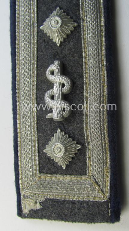 Neat - albeit regrettably single! - neatly 'cyphered' pair of WH (Luftwaffe) NCO-type shoulderstrap as piped in the darker-blue-coloured branchcolour as was intended for an: 'Oberfeldwebel der Sanitäts-Truppen'