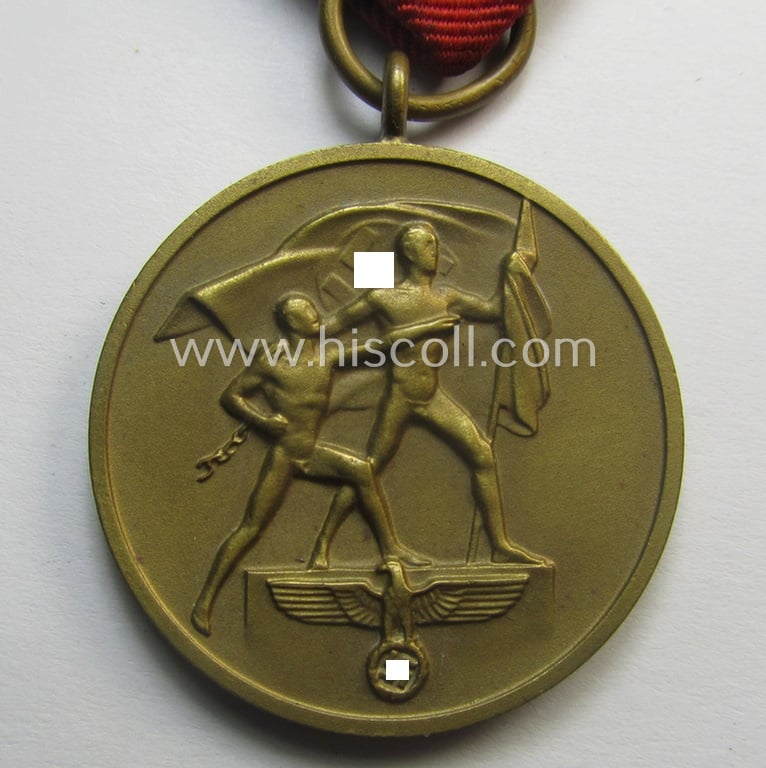 WH Czech-occupation- (ie. 'Anschluss'-) medal: '1. Oktober 1938' that comes with its period-attached 'PB-Spange' (and ribbon-bar) and that comes stored in its bordeaux-red-coloured- and/or non-maker-marked etui