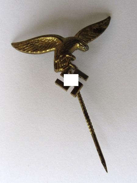 Neat, golden-toned (WH) Luftwaffe-related lapel-pin to be worn on the civil attire as intended for staff-members of the 'Luftwaffe', depicting an early pattern (i.e. 'down-tail'-modelled-) eagle - very nice, IMO only minimally used ie. worn, conditio