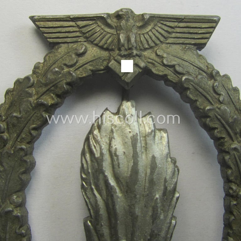 WH (KM) 'Kriegsabzeichen für Minensuch-, U-Boot-Jagd und Sicherungs-Verbände' being a typical non-maker-marked, 'Feinzink'-based example as was (I deem) produced by the: 'Adolf Scholze'-company