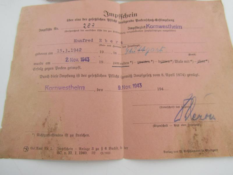 Birth certificate and vaccination card from one person