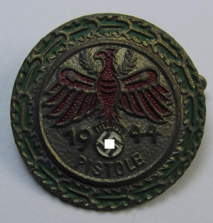 Attractive - and unusally seen! - multi-coloured enamelled (and zinc- ie. 'Feinzink'-based), smaller-sized, so-called: 'Gaumeisterabzeichen in Gold für Pistole 1944 des Standschützenverbandes Tirol-Vorarlberg'