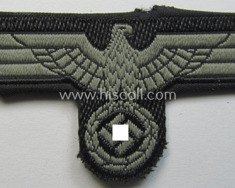 Neat, WH (Heeres) later- (ie. mid-war-) period- and/or bluish-grey-coloured 'Panzer'-type side-cap-eagle a executed in the neat 'BeVo'-weave pattern on a black-coloured background