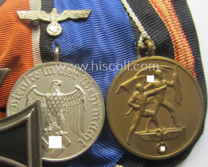 Three-pieced, WWII-period medal-bar (ie. 'Ordenspange') that resp. shows an: 'EK II. Kl.' (by the desirable 'Juncker'-company!), a: WH (Heeres o. KM) 'DA 4. St.' and a Czech 'Anschluss'-medal: '1. Oktober 1938'