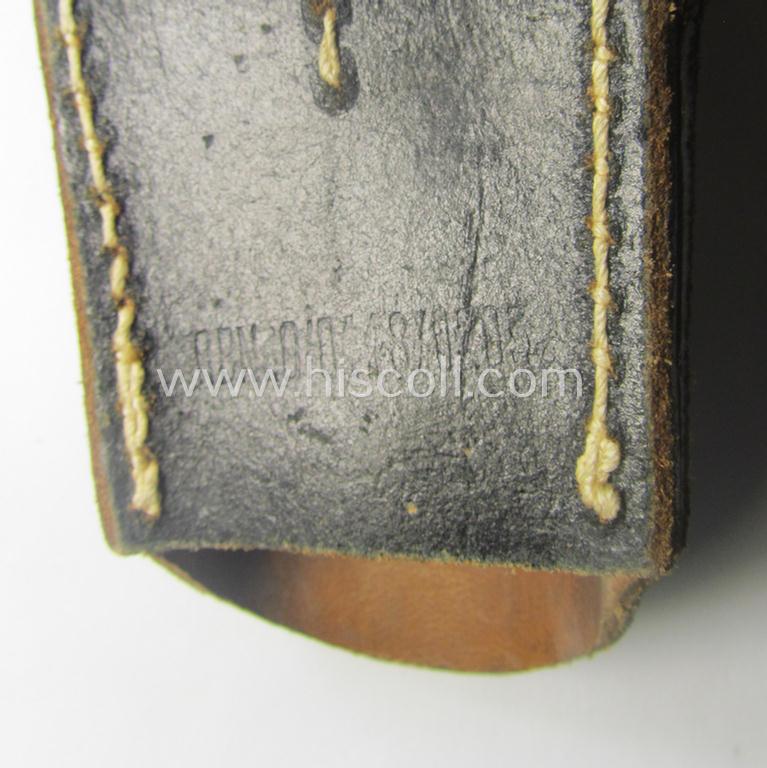 Genuine-leather-based- and/or black-coloured, 'standard-pattern' (and I deem later-war-period) WH (Heeres, Waffen-SS, Luftwaffe etc.) so-called: K98 bayonet-frog (ie. 'Tragetasche o. Koppelschuh') being a maker-marked (ie. 'RbN.'-numbered) exam...