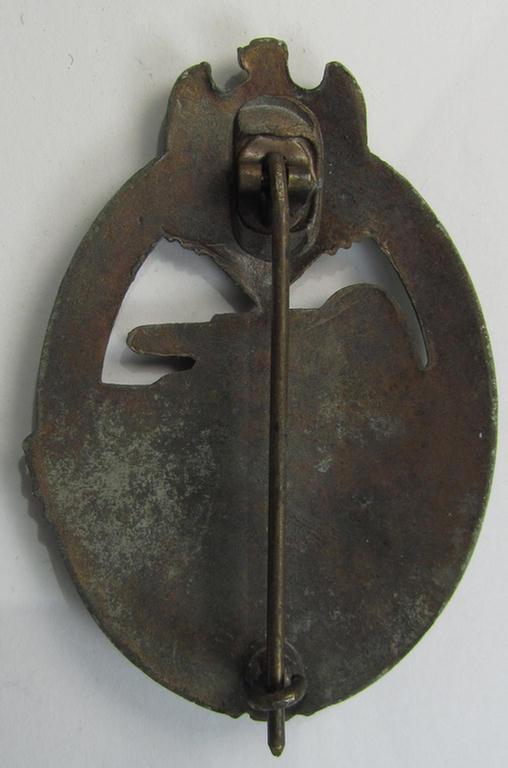 Attractive, 'Panzerkampfabzeichen in Bronze' (or: bronze-class panzer assault badge or PAB) being a neat zinc- (ie. 'Feinzink'-) version (of the so-called: 'horizontal-crimp'-variant) as was procuced by the: 'Steinhauer & Lück'-company