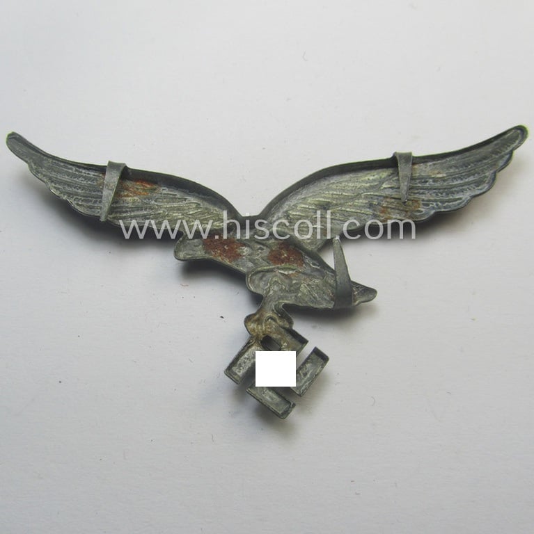 Minimally worn, WH (Luftwaffe) EM/NCO-pattern visor- (ie. 'Schirmmützen'-) cap-eagle being a non-maker-marked example as executed in zinc- ('Feinzink'-) based metal