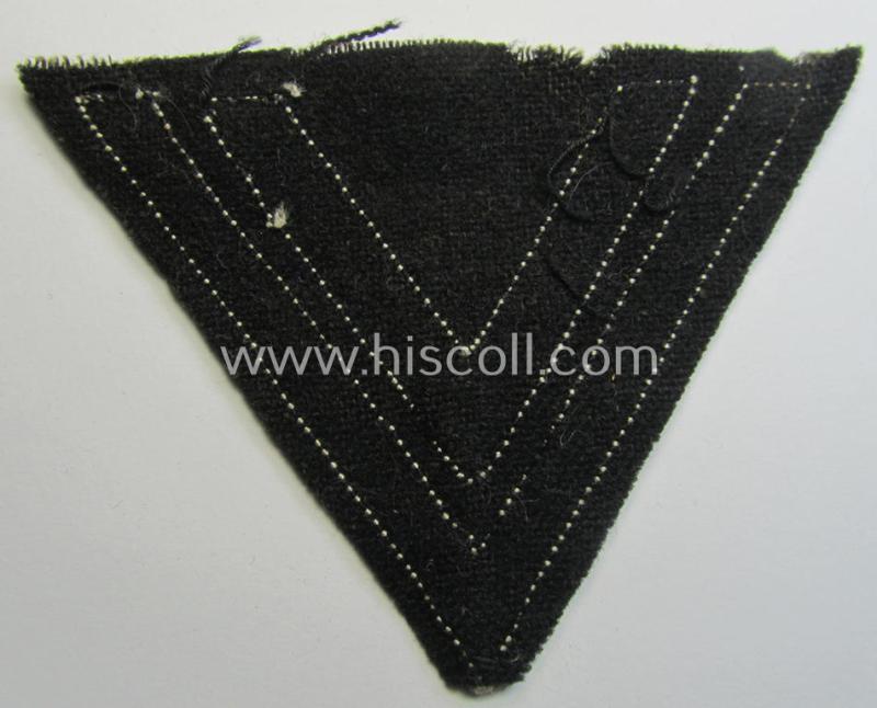 Neat - and just moderately used! - Waffen-SS- (ie. Heeres Panzer-) type 'Armwinkel' (or: rank-chevron) as executed on black-coloured wool as was intended for an: 'SS-Rottenführer' (ie. 'Obergefreiter')