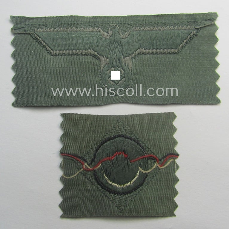 Early- (ie. mid-) war-period, WH (Heeres) cap-eagle & cocarde-set (ie. 'Schiffchenmützen-Adler u. Kokarde-Satz für Mannschaften u. Uffz.') being a 'virtually mint' set as executed in bluish-grey-coloured linnen on a field-grey-coloured background