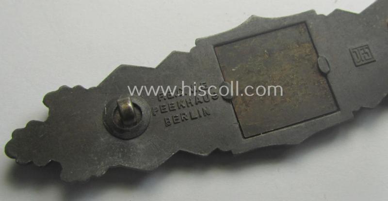 'Nahkampfspange in Bronze' (or: bronze-class close-combat clasp ie. CCC) being a neatly maker-marked- and/or minimally converse-shaped specimen as was produced by the: 'JFS'- (ie. 'Joseph Feix u. Söhne'-) company