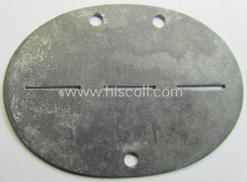 Superb - and truly scarcely found! - typical zinc-based, WH (Heeres-) ie. 'Gebirgsjäger'-related ID-disc (ie. 'Erkennungsmarke') bearing the clearly stamped unit-designation that reads: '7./Geb.Jäg.E.Btl. 98' and that comes as issued and found