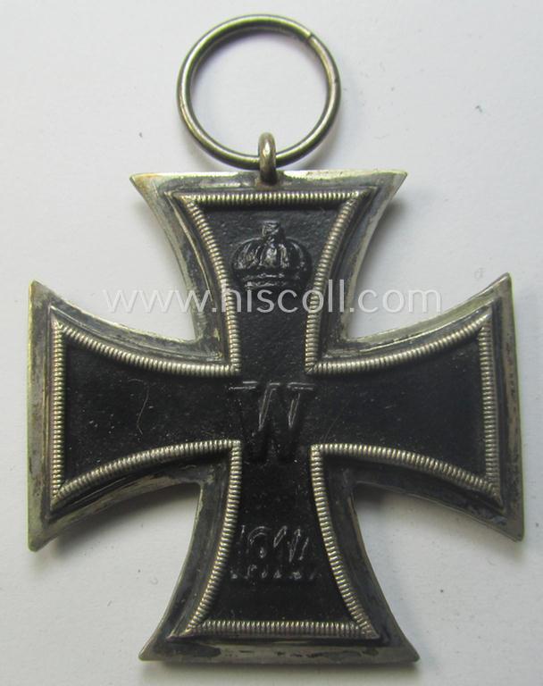 WWI-period: 'Eisernes Kreuz II. Klasse' (or: iron cross second class) being a (typical) non-maker-marked example that comes together with its (minimally) confectioned piece of ribbon (ie. 'Bandabschnitt')