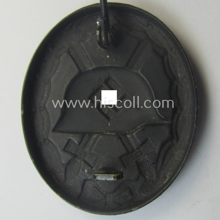 Neat - albeit non-maker-marked and typical magnetic! - example of a black-class wound-badge (or: 'Verwundeten-Abzeichen in Schwarz') that comes in an overall nice- (ie. I deem just minimally used-), condition