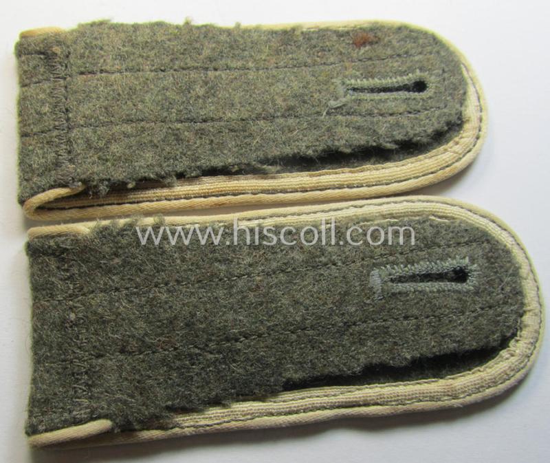Superb - and fully matching! - pair of later-war-period, so-called: 'M44'-pattern, 'simplified' WH (Heeres) EM-type shoulderstraps as piped in the white-coloured branchcolour as was intended for usage by a: 'Soldat der Infanterie-Truppen'