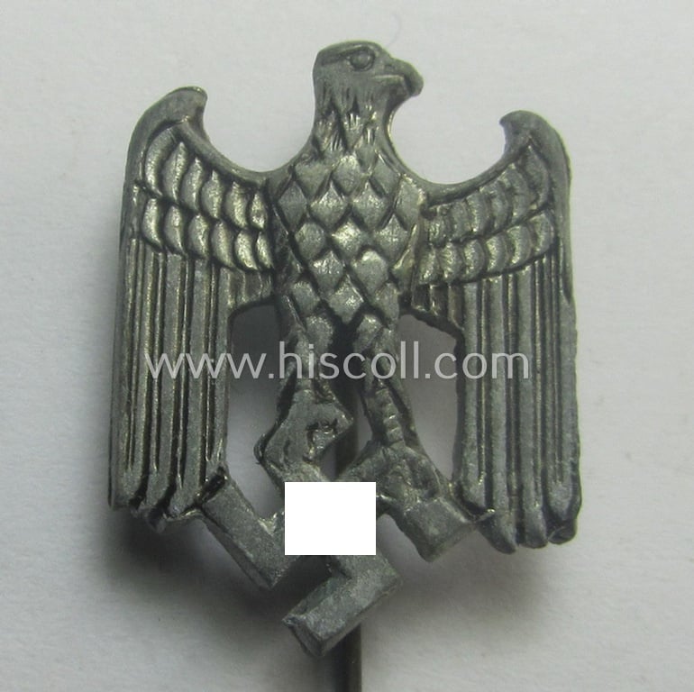 Greyish-silver-toned- (and: 'Feinzink'-based) WH (Heeres) so-called: 'Zivilabzeichen' (or: army civil-attire badge) being a detailed (albeit non-maker-marked) example that comes mounted onto its longer-sized pin