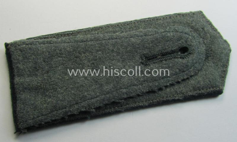 Single - and actually not that often seen! - WH (Heeres) EM-type (ie. 'M36-/M40'-pattern- and 'pointed styled-') 'cyphered' shoulderstrap as was intended for usage by a: 'Soldat des Artillerie-Regiments 34'