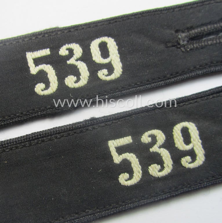Attractive - and naturally single! - so-called: 'DJ- o. Deutsches Jungvolk' shoulderstrap as was intended for usage by a: 'DJ-Mitglied' serving within the: 'Bann 539' (539 = 'Vöcklabruck') and that still shows its period-attached, 'RzM'-etiket
