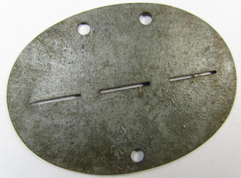 Zinc-based, 'Organisation Todt'-related ID-disc (ie. 'Erkennungsmarke') bearing the clearly stamped designation that reads: 'Org. Todt - 401152'