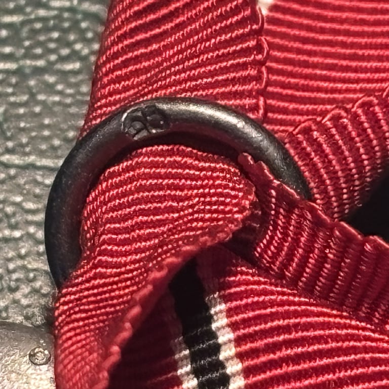 Eastern Front Medal with Ribbon "65" Klein & Quenzer